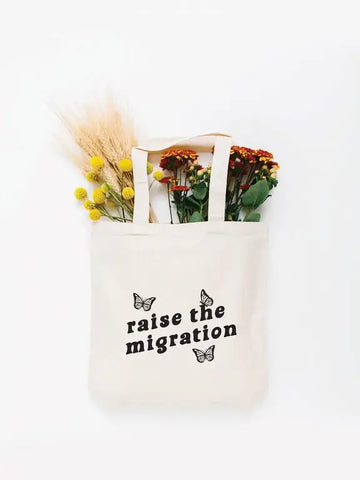 Raise a Migration Tote Bag