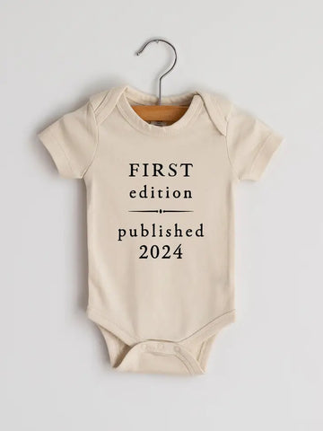 Cream First Edition 2024 Book Style Organic Baby Bodysuit