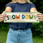 "Slow Down" Embroidered Canvas Banner