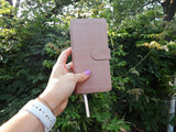 NIV, Pocket Thinline Bible, Leathersoft, Pink, Snap Closure, Red Letter, Comfort Print by Zondervan
