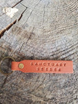 'Sanctuary Seeker' Stamped Leather Keychain
