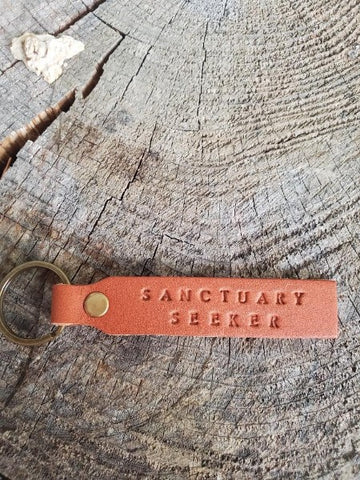 'Sanctuary Seeker' Stamped Leather Keychain